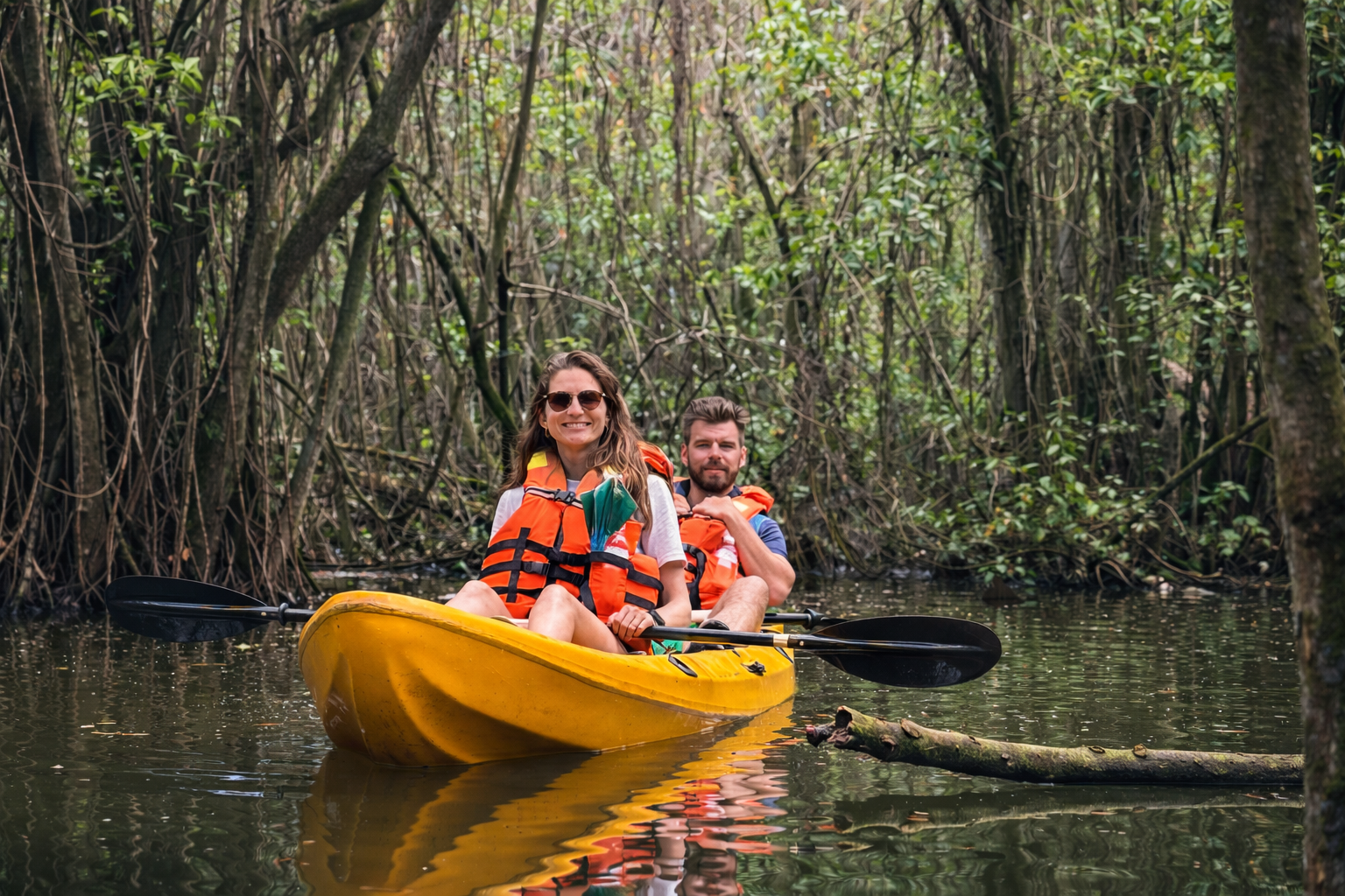 Sunrise kayaking in Mawella Lagoon near Tangalle Sri Lanka with calm golden water
